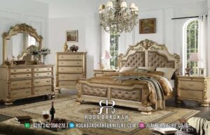 Tempat Tidur Taupe Mewah dengan rangka kayu jati dan finishing Gold Leaf, sempurna untuk menambahkan nuansa klasik dan kemewahan di kamar tidur Anda.
