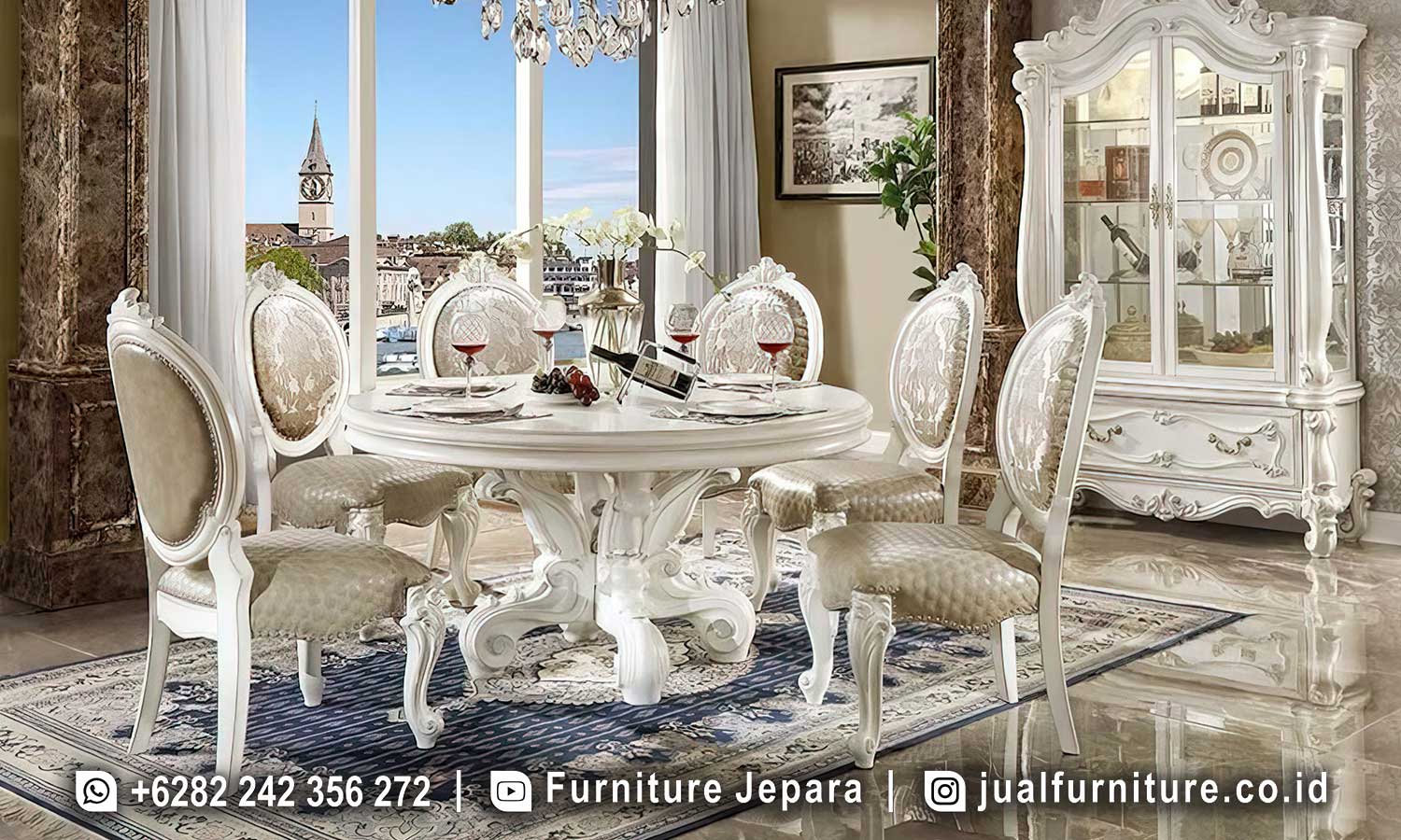 Meja Makan Ruang Makan Magnifico dengan desain ukiran klasik dan jok empuk dari kayu jati finishing cat duco putih, sempurna untuk nuansa melegenda dan mewah.